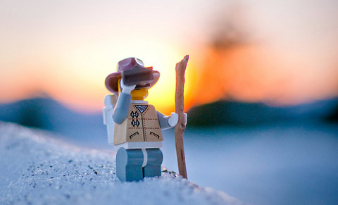 photo of a lego guy looking into the horizon with the sun setting, represents the importance of SEO